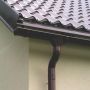 Lindab Steel One-Piece Downpipe Offset - 75mm Coffee Brown
