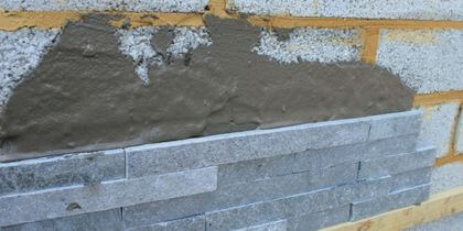 How to Clad a Brick Wall